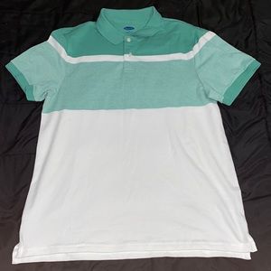 A green and white shirt with buttons